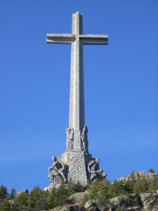 Monumental cross at Valle de los Caídos Catholic basilica in Spain